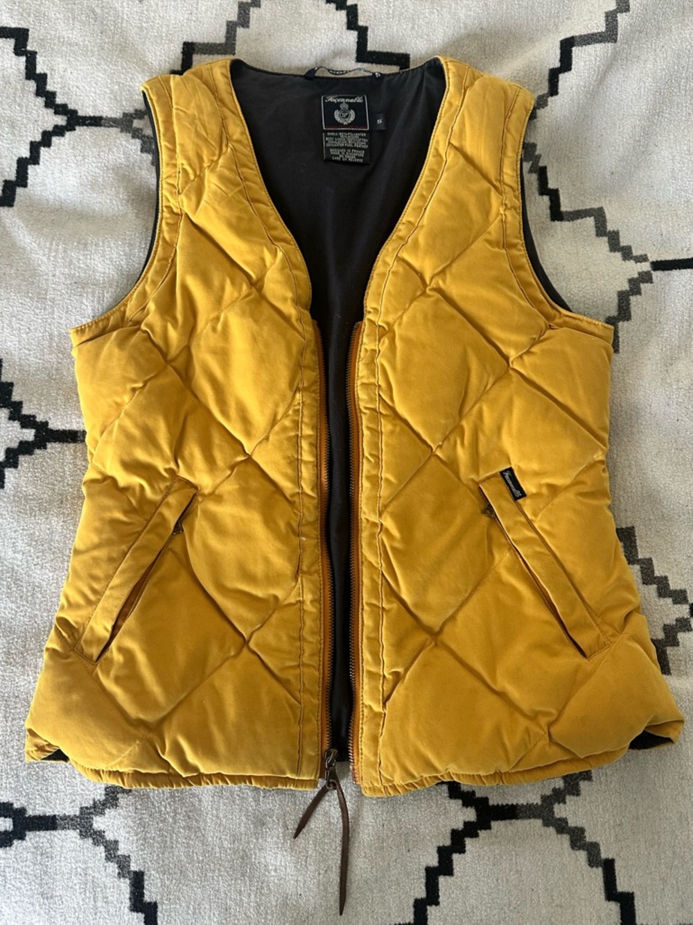Yellow quilted down vest